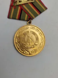 Verdienstmedaille der Grenztruppen der Deutschen Demokratischen Republik" & FÜR HERVORRAGENDE VERDIENSTE"  medalje