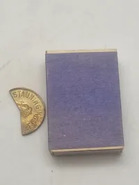 Original Stauningkrone", som er en KU propagandamønt fra 1933.