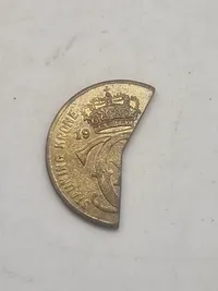 Original Stauningkrone", som er en KU propagandamønt fra 1933.