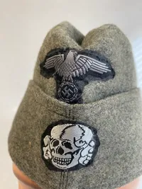 Waffen SS skråhue - Postwar