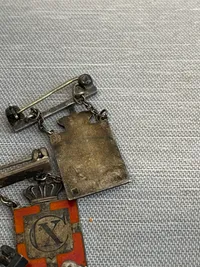 Samling originale Georg Jensen kongemærker