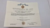 Amerikansk Army Achievement Medal med papir. Original