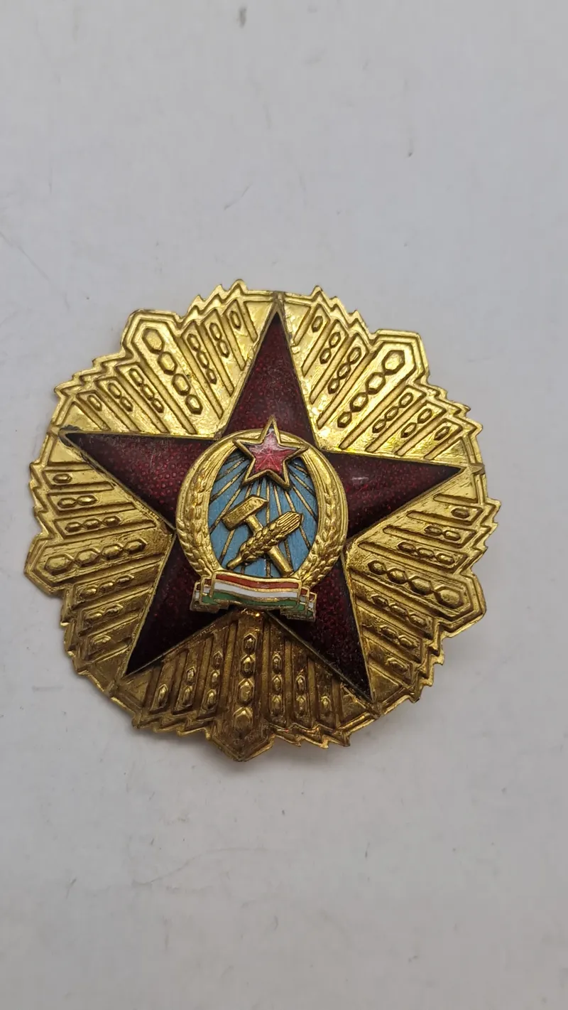 Order of Merit of the Hungarian People's Republic (Den Ungarske Folkerepubliks Fortjenstorden), som blev indstiftet i 1949. Original