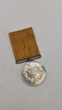 Dansk Brandvæsens Medalje for 25 års tjeneste. Original