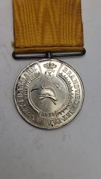 Dansk Brandvæsens Medalje for 25 års tjeneste. Original