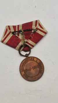 Dansk deltager medalje fra 1848-50 krigen med krydsbånd. Original
