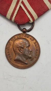 Dansk deltager medalje fra 1848-50 krigen med krydsbånd. Original