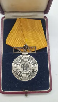 Dansk Hæderstegn for god tjeneste i brandvæsnet (Fire Department Long Service Medal), som blev indstiftet den 29. juli 1903. Original