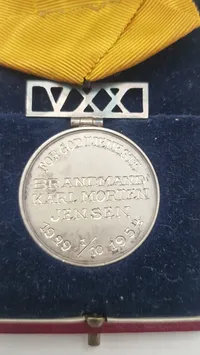 Dansk Hæderstegn for god tjeneste i brandvæsnet (Fire Department Long Service Medal), som blev indstiftet den 29. juli 1903. Original