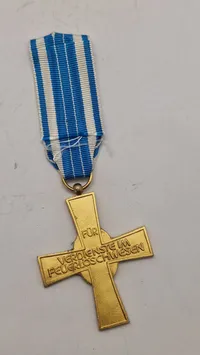 Bayerisches Feuerwehr-Ehrenzeichen i guld for 50 års tjeneste. 
Original