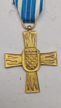 Bayerisches Feuerwehr-Ehrenzeichen i guld for 50 års tjeneste. 
Original