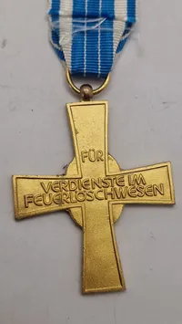 Bayerisches Feuerwehr-Ehrenzeichen i guld for 50 års tjeneste. 
Original