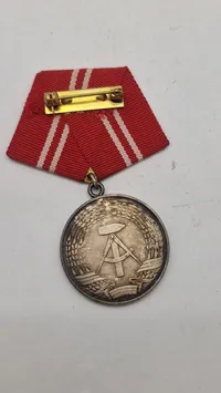 Tysk Medaille für treue Dienste in den Kampfgruppen der Arbeiterklasse" fra DDR. Original