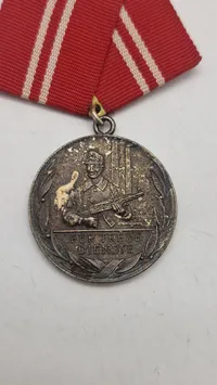 Tysk Medaille für treue Dienste in den Kampfgruppen der Arbeiterklasse" fra DDR. Original