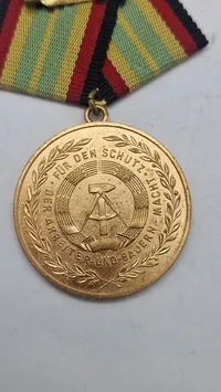 Tysk Medalje for Tjenesteloyalitet i den Nationale Folkearmé (NVA). Original