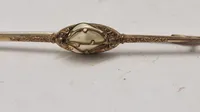 Forgyldt broche, start 1900 tallet