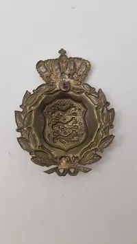 Dansk M/23 hjelmmærke. Original