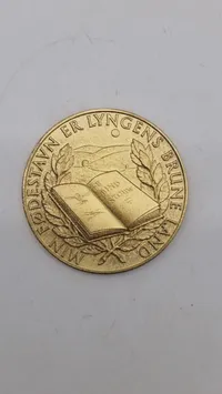 Dansk bronzemedalje med et portræt af den danske forfatter og præst Steen Steensen Blicher