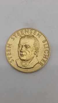 Dansk bronzemedalje med et portræt af den danske forfatter og præst Steen Steensen Blicher
