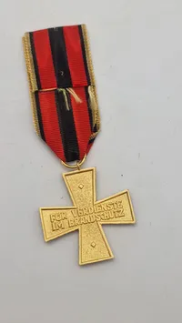 Tysk brandsikringshæderstegn (Feuerwehrehrenkreuz), specifikt fra delstaten Rheinland-Pfalz. Original