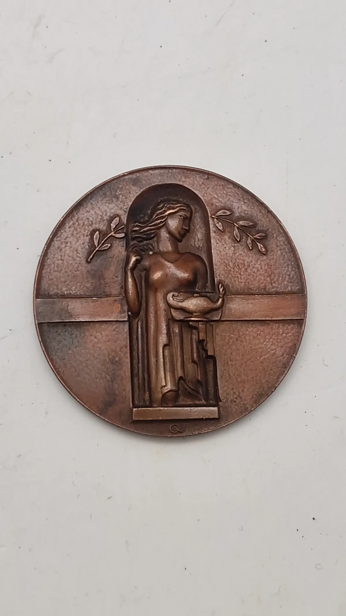 Finsk bronzemedalje fra 1946 med titlen “Benignitatis Humanae Finlandia Memor”.