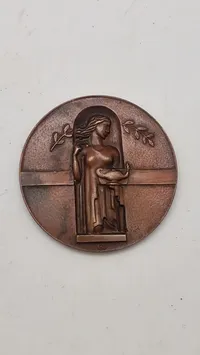 Finsk bronzemedalje fra 1946 med titlen “Benignitatis Humanae Finlandia Memor”.