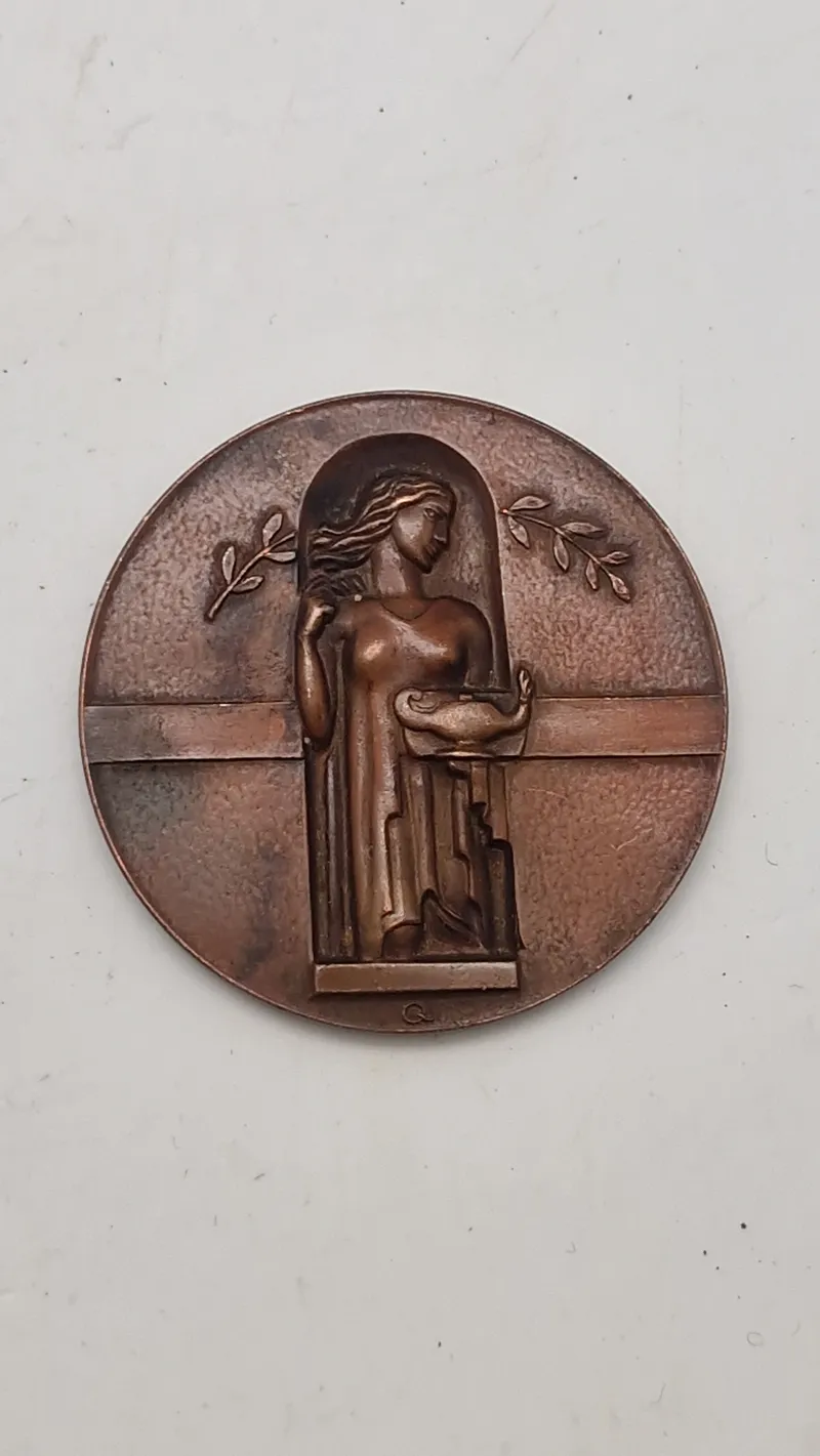 Finsk bronzemedalje fra 1946 med titlen “Benignitatis Humanae Finlandia Memor”.