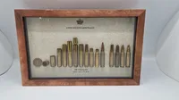 Display Ammunitionsarsenalet Trækstadier for 308. Winchester Nato 
7,62 x 51 mm samt løspatron. 32 x 20 Cm