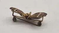 Filigran broche af 830 sølv