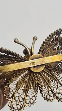 Filigran broche af 830 sølv