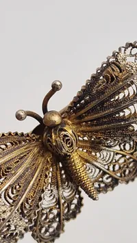 Filigran broche af 830 sølv