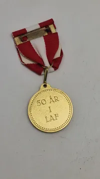 50 års medalje fra LAF. Original