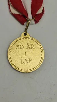 50 års medalje fra LAF. Original