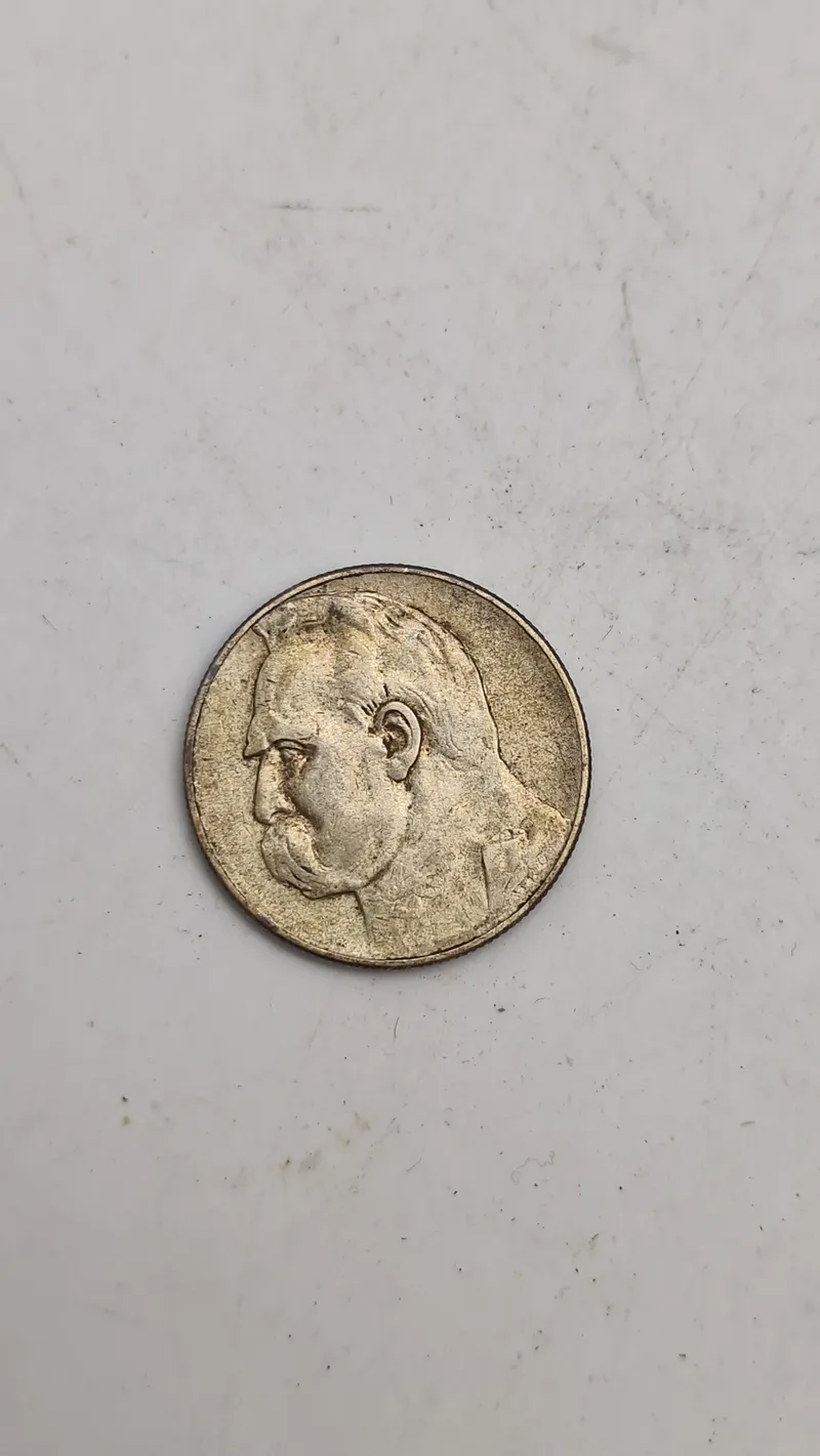 Polsk 5 złoty sølvmønt fra 1935, der er præget for at ære marskal Józef Piłsudski.