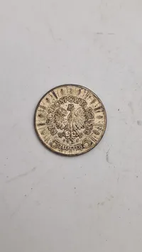 Polsk 5 złoty sølvmønt fra 1935, der er præget for at ære marskal Józef Piłsudski.