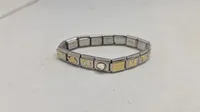 Nomination composable armbånd lavet af rustfrit stål med 18K guld- og zirconia-detaljer