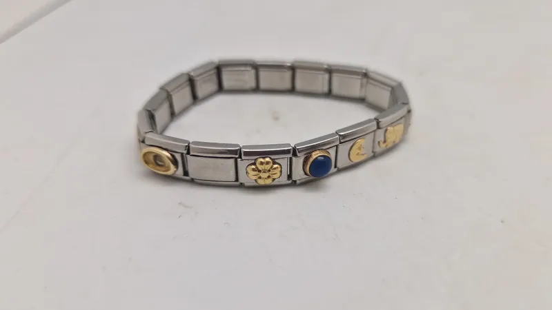Nomination composable armbånd lavet af rustfrit stål med 18K guld- og zirconia-detaljer