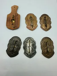 Samling lommeskjold (brandvæsen). Originale