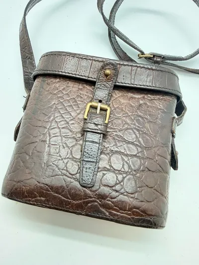 A MULBERRY BROWN CROCODILE LEATHER HAND BAG, binocular style, original