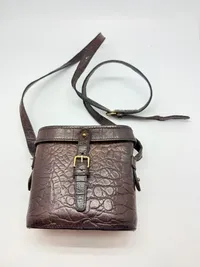 A MULBERRY BROWN CROCODILE LEATHER HAND BAG, binocular style, original