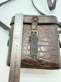 A MULBERRY BROWN CROCODILE LEATHER HAND BAG, binocular style, original