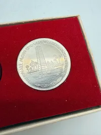 Samling DDR mønter med KZ lejre