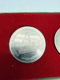 Samling DDR mønter med KZ lejre