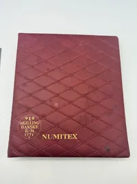 Møntsamling med album