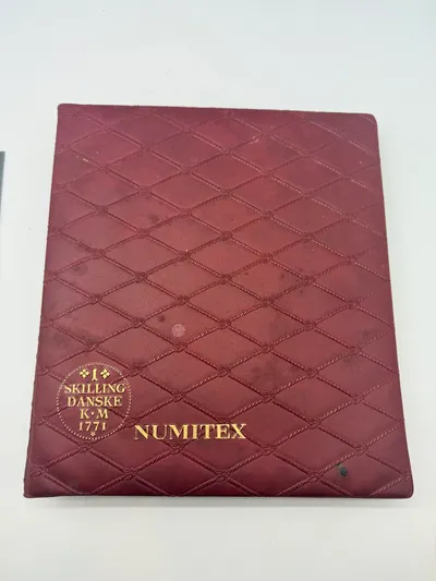 Møntsamling med album