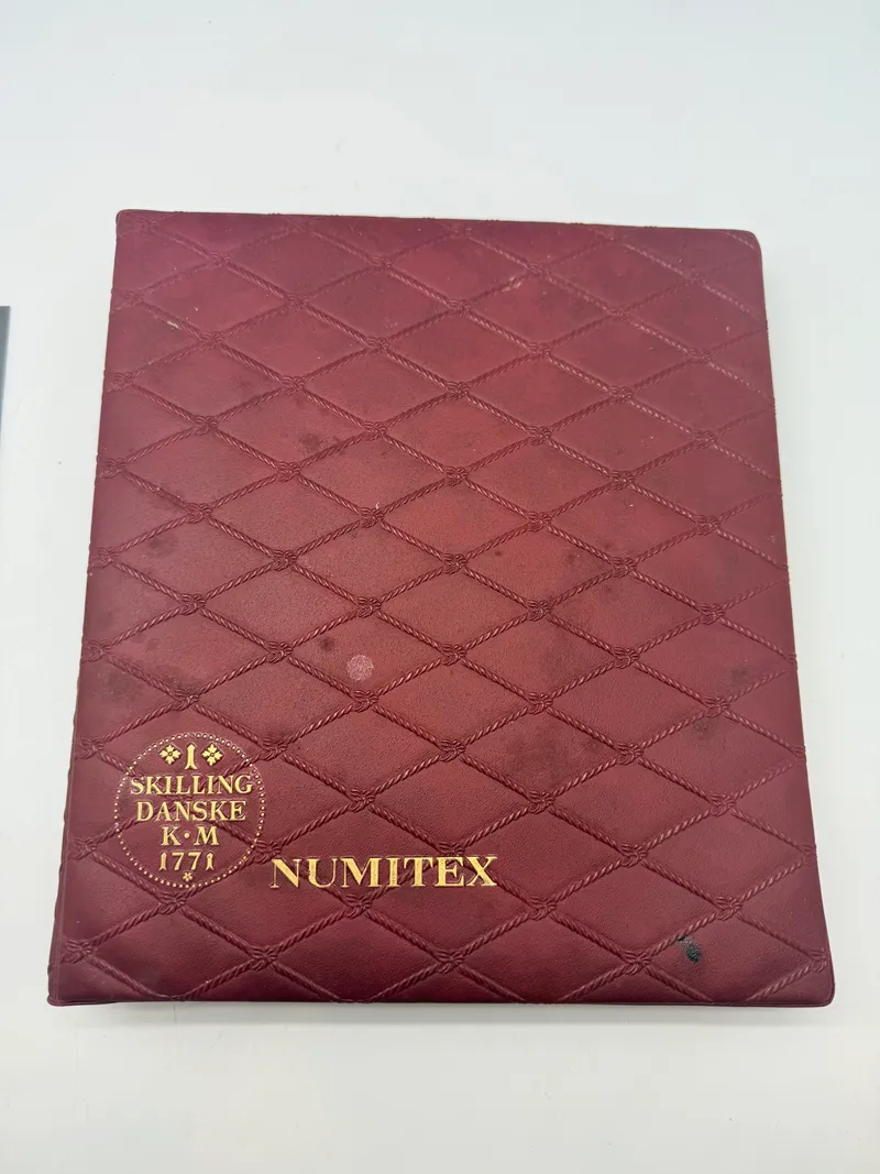 Møntsamling med album