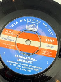 Plade med kapitulations øjeblikket