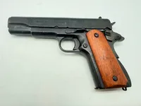 Colt m1911,  Denix metal kan tage ladegreb