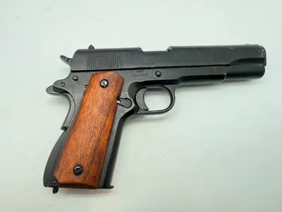 Colt m1911,  Denix metal kan tage ladegreb