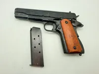 Colt m1911,  Denix metal kan tage ladegreb